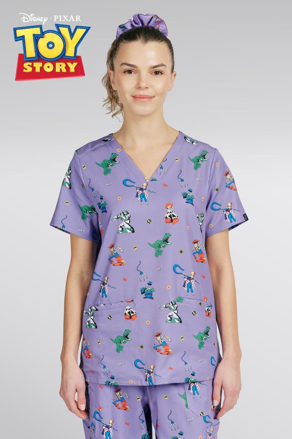 Disney’s Toy Story Women’s 3-Pocket Scrub Top, You’ve got a Friend