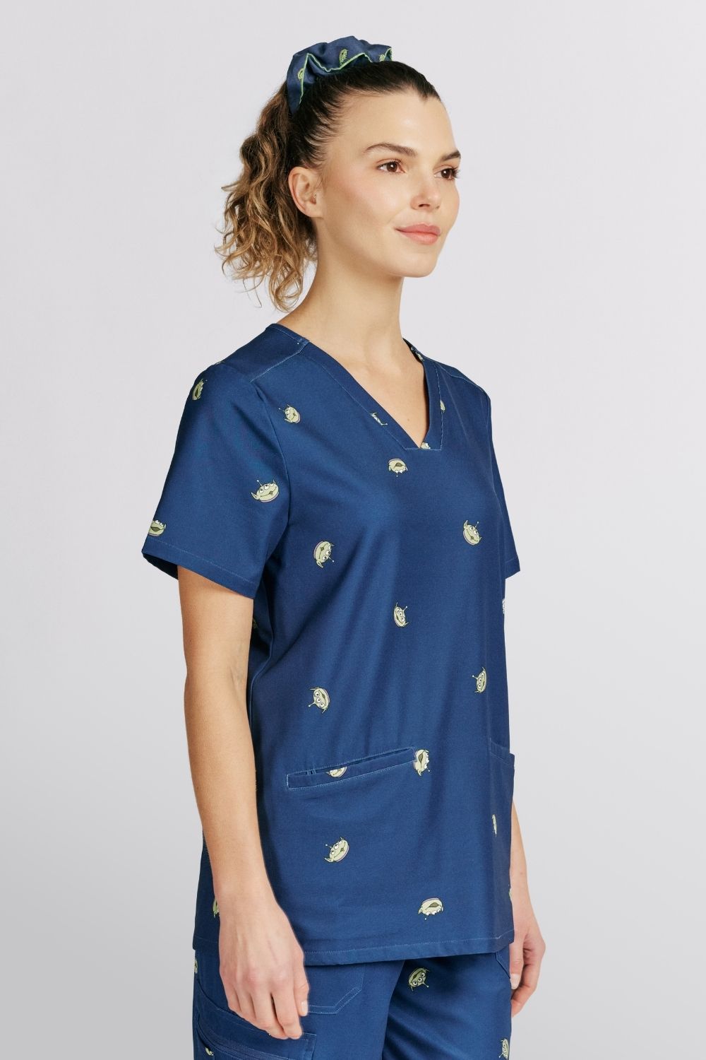 Disney’s Toy Story Women’s 3-Pocket Scrub Top, Little Green Men