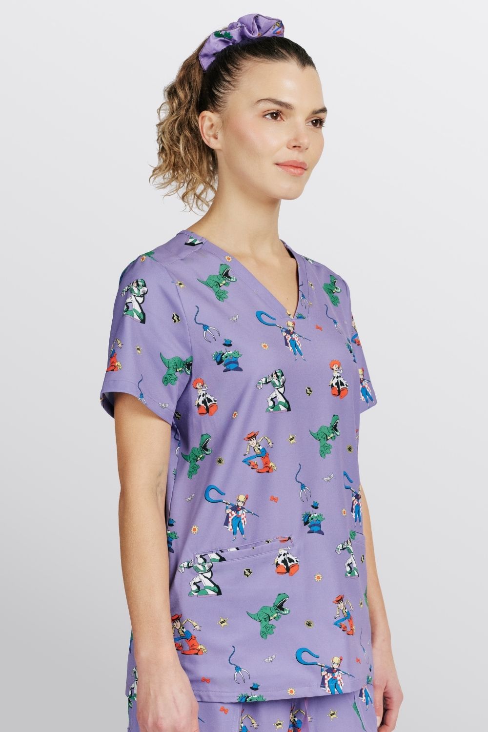 Disney’s Toy Story Women’s 3-Pocket Scrub Top, You’ve got a Friend