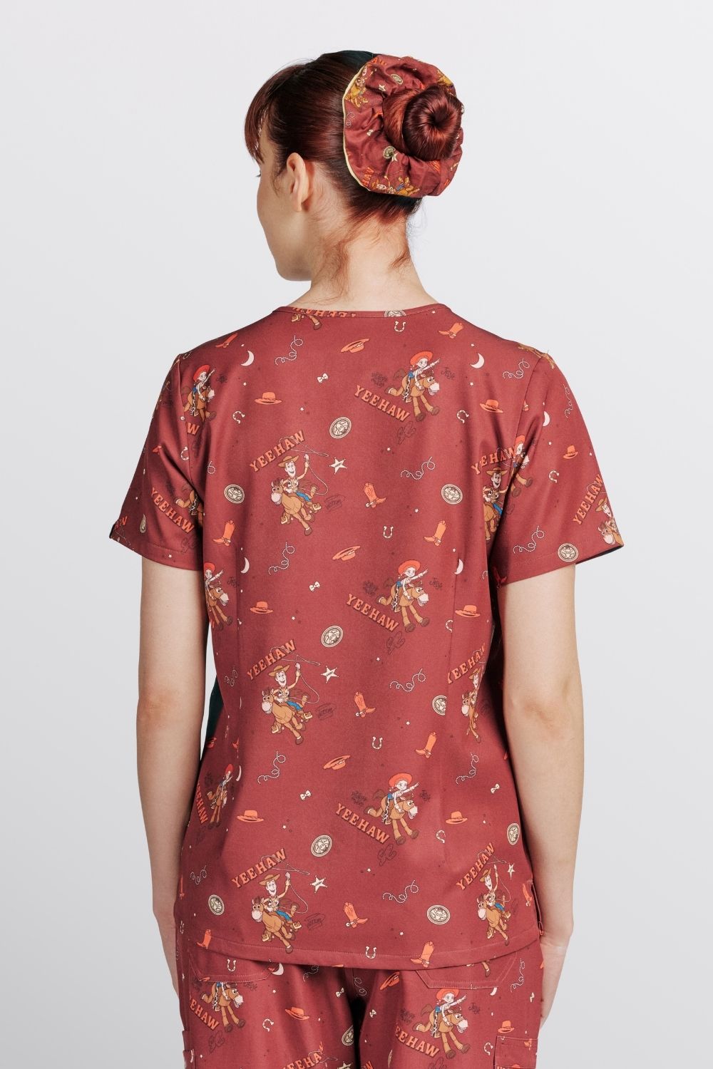 Disney’s Toy Story Women’s 3-Pocket Scrub Top, Yeehaw