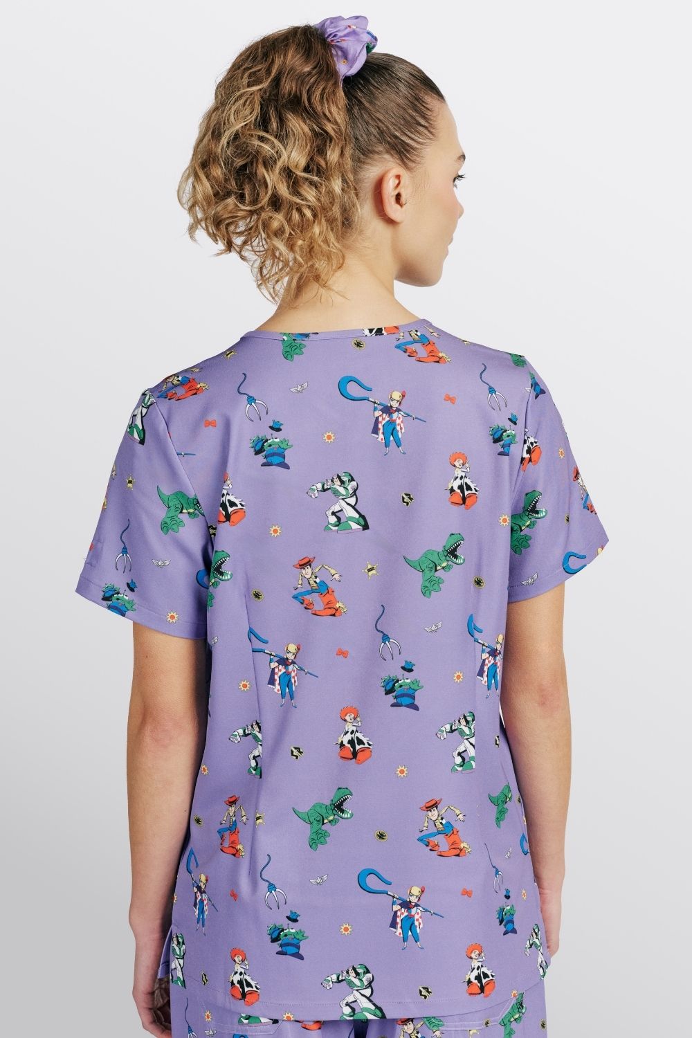 Disney’s Toy Story Women’s 3-Pocket Scrub Top, You’ve got a Friend