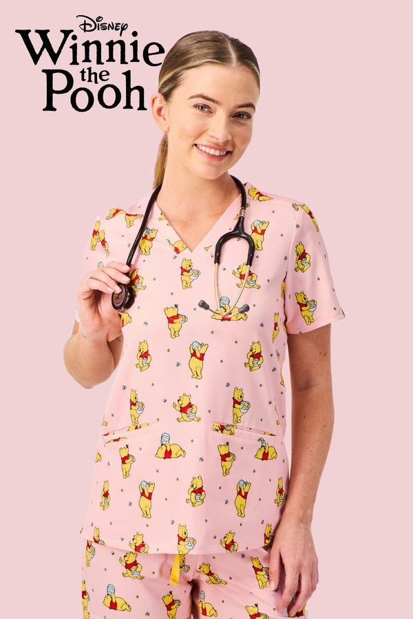 Disney’s Winnie the Pooh Women’s 3-Pocket Scrub Top, Honey Pot
