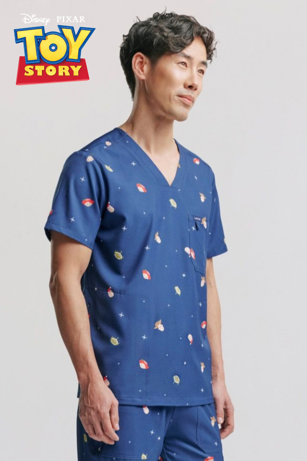 Disney & Pixar’s Toy Story Men's 3-Pocket Scrub Top, Ho Ho Howdy
