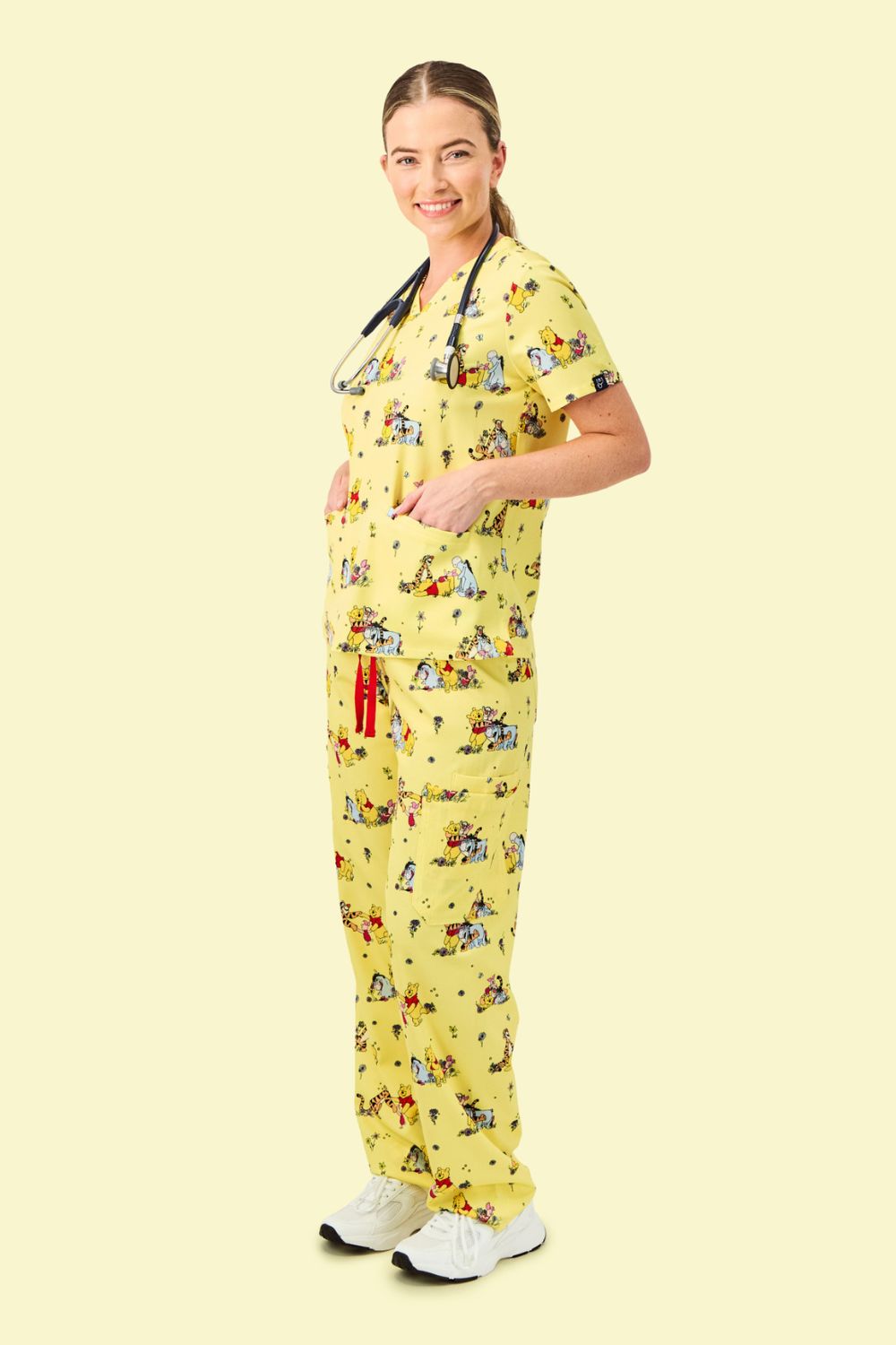 Disney’s Winnie the Pooh and Friends Women’s 3-Pocket Scrub Top, Favourite Day