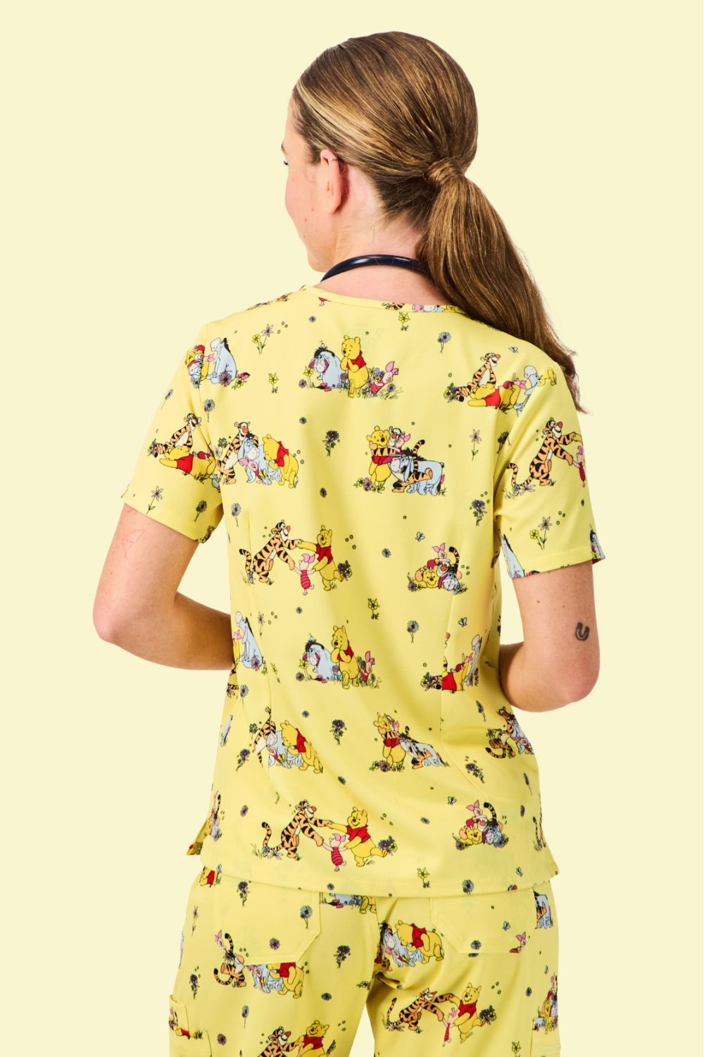 Disney’s Winnie the Pooh and Friends Women’s 3-Pocket Scrub Top, Favourite Day