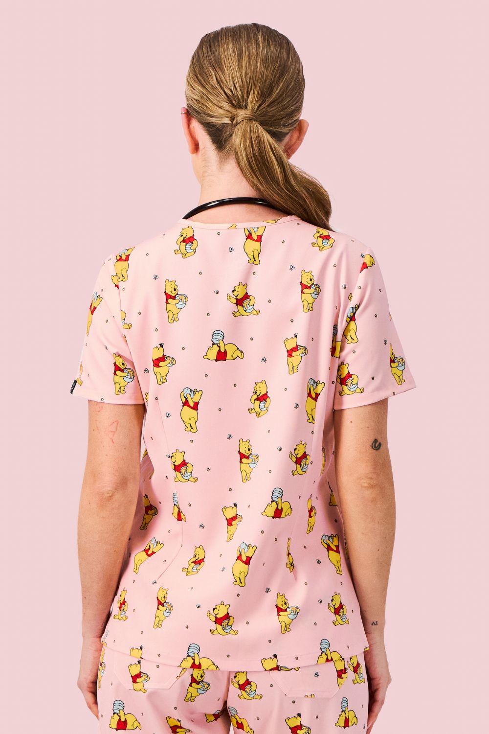 Disney’s Winnie the Pooh Women’s 3-Pocket Scrub Top, Honey Pot