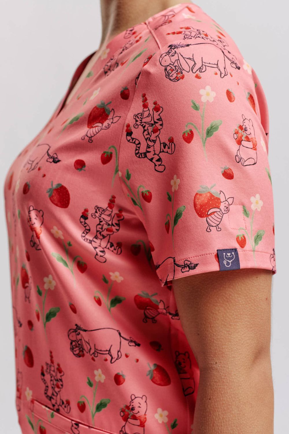 Disney's Winnie The Pooh Women’s 3-Pocket Scrub Top, Strawberry Springtime