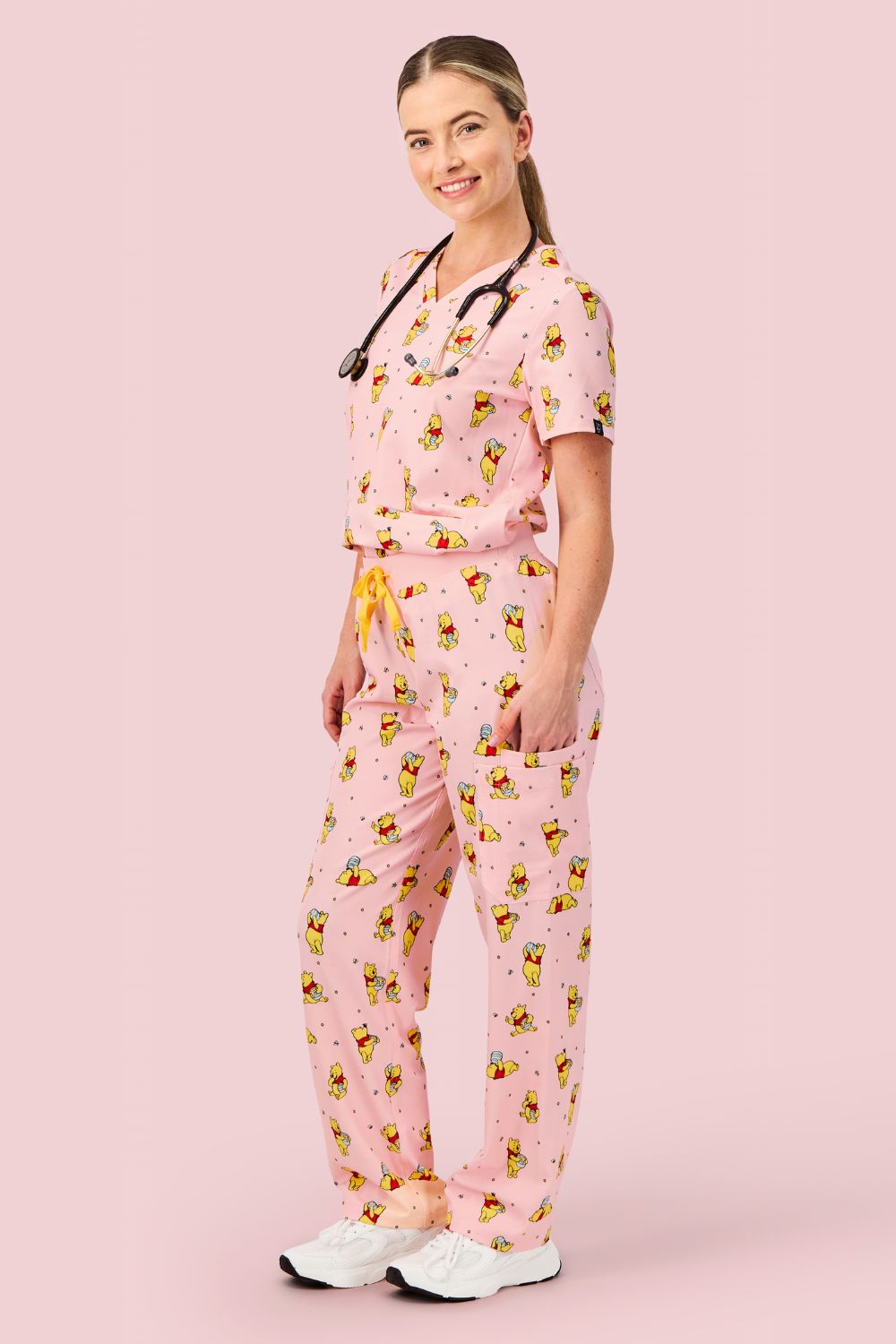 Disney’s Winnie the Pooh Women’s Cargo Scrub Pants, Honey Pot
