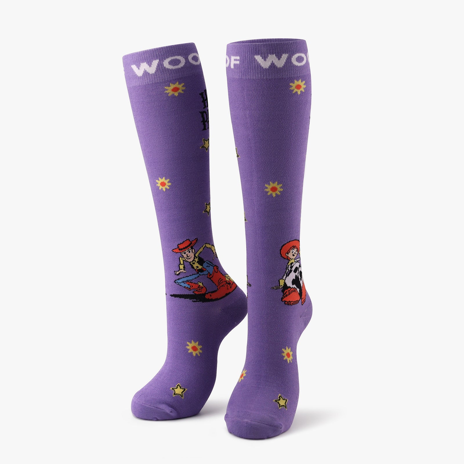 A pair of vibrant purple compression socks featuring Buzz Lightyear and Little Green Men from Disney and Pixar’s Toy Story. 