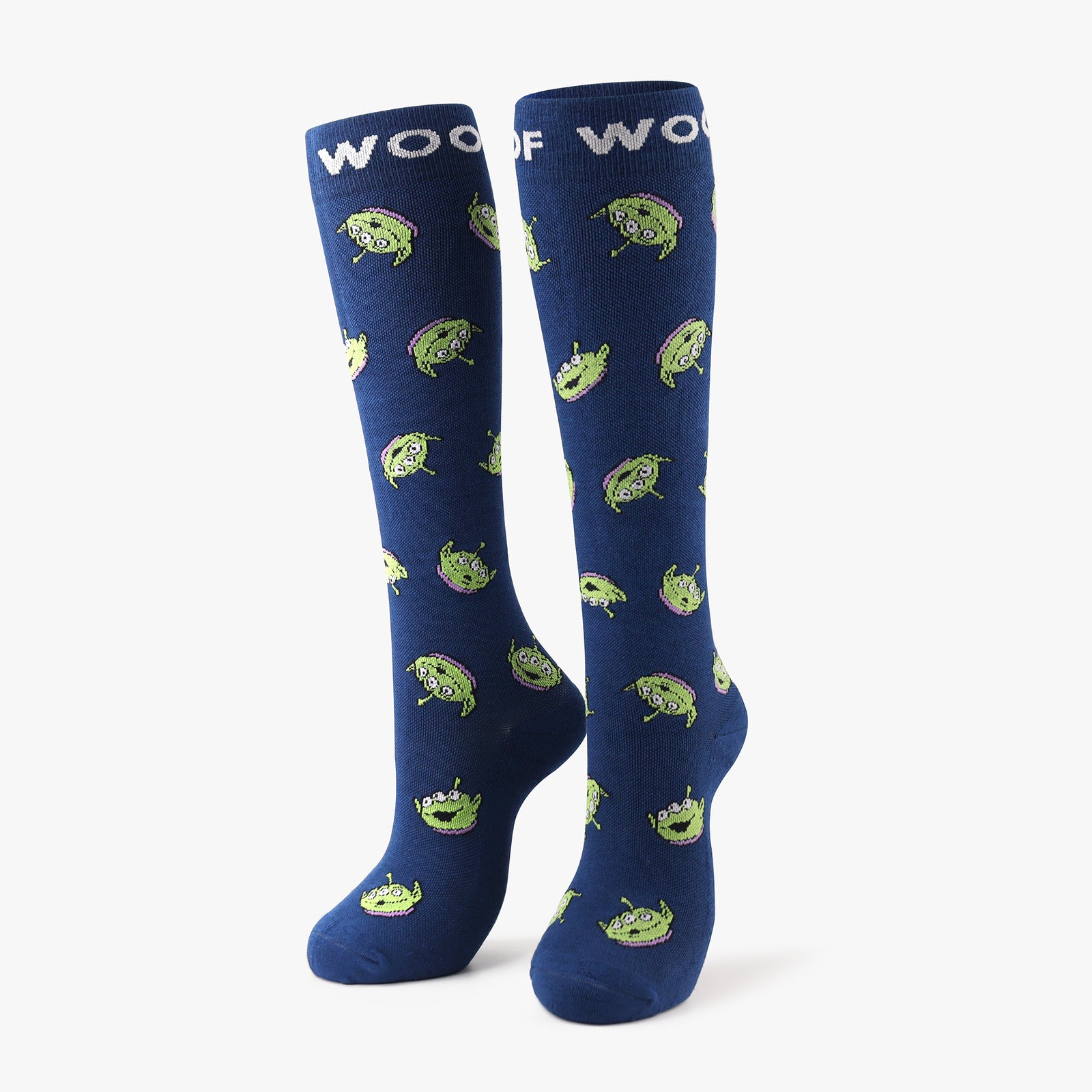 A pair of navy blue compression socks featuring the Little Green Men Disney and Pixar’s Toy Story. 