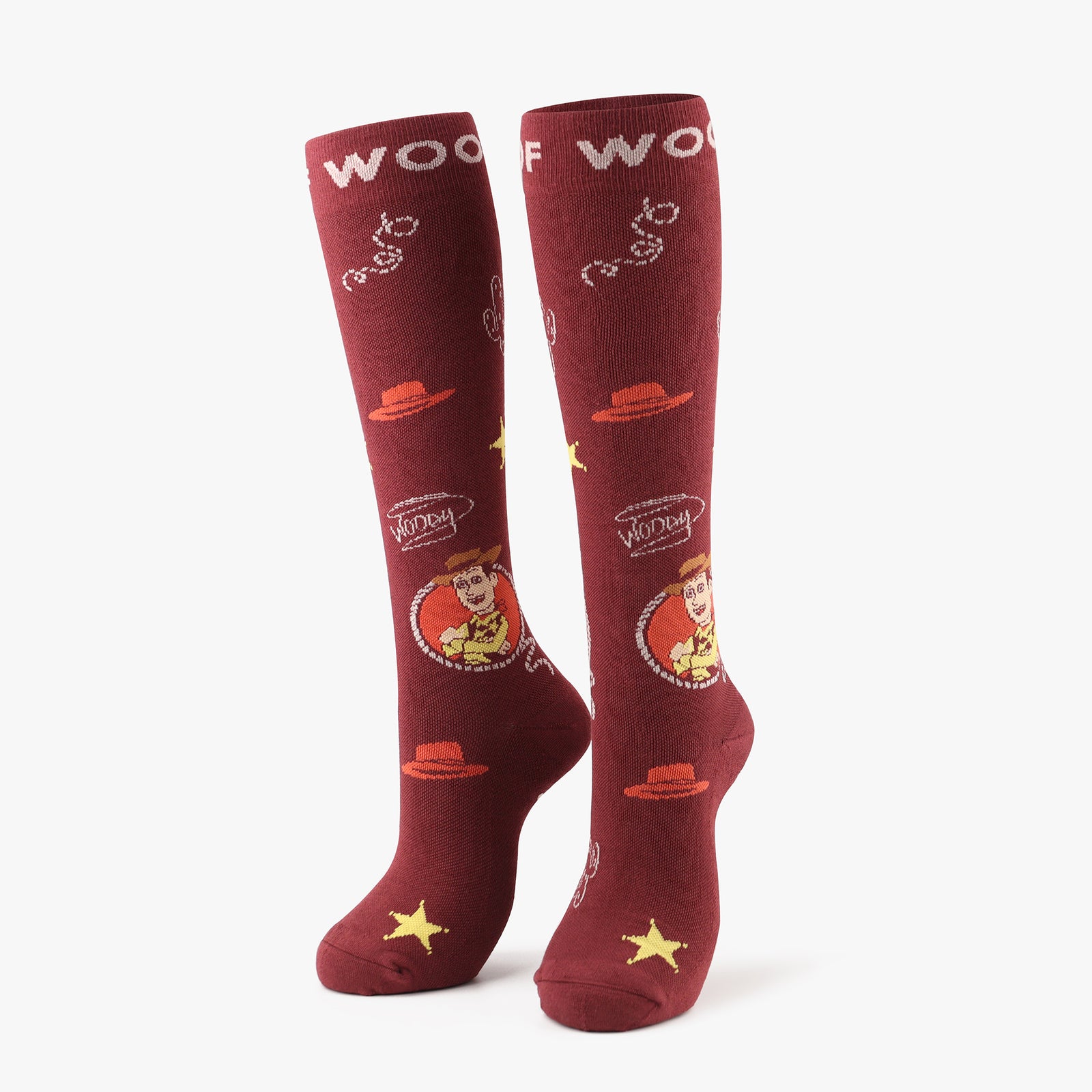 A pair of redish brown compression socks featuring Woody from Disney and Pixar’s Toy Story. 