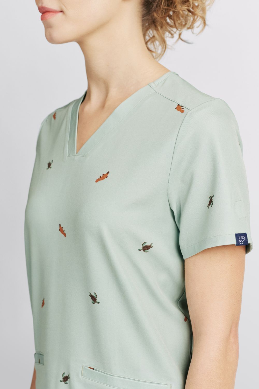 Freshwater Friends Women’s 3-Pocket Scrub Top