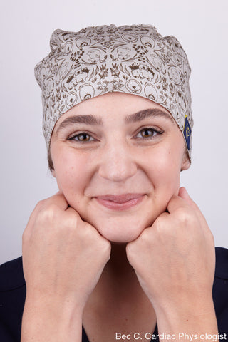 A Cardiac Physiologist Wearing a Dr. Woof Wombat Surgical Scrub Cap Tie Back