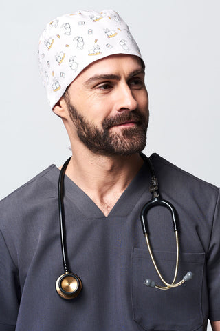 A Dental Hygienist Wearing a Dr. Woof Little Bunny Surgical Scrub Cap Tie Back